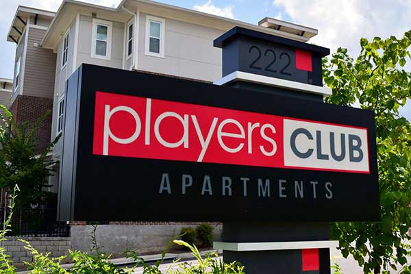 Players Club Apartment Complex Monument